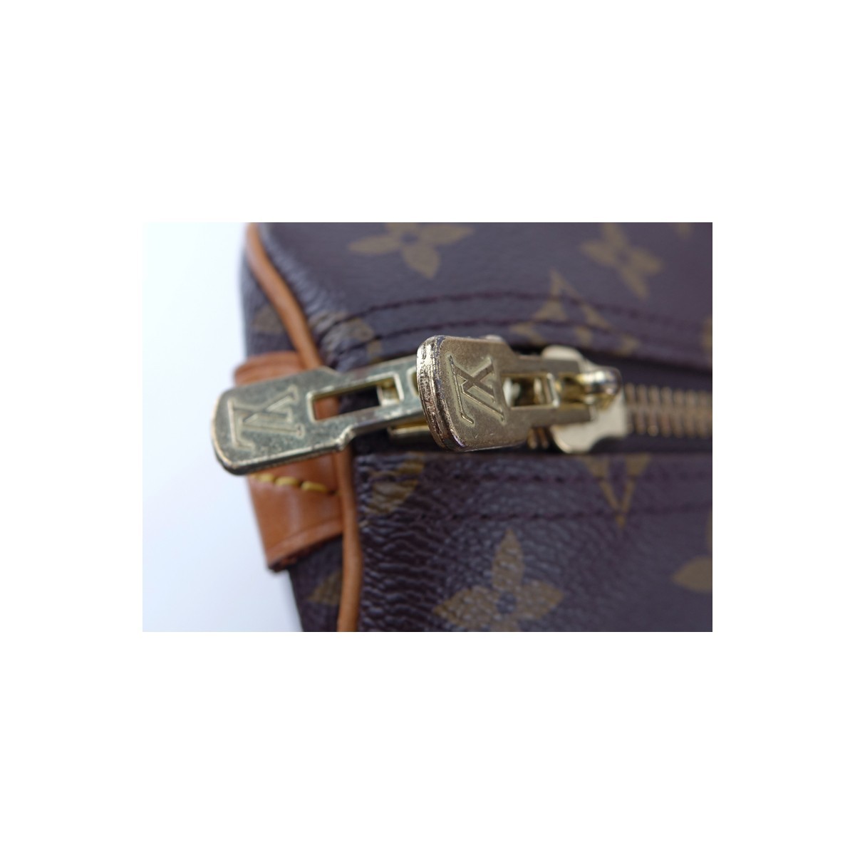 Louis Vuitton Brown Monogram Coated Canvas Keepall Travel Bag 55. Golden brass hardware.