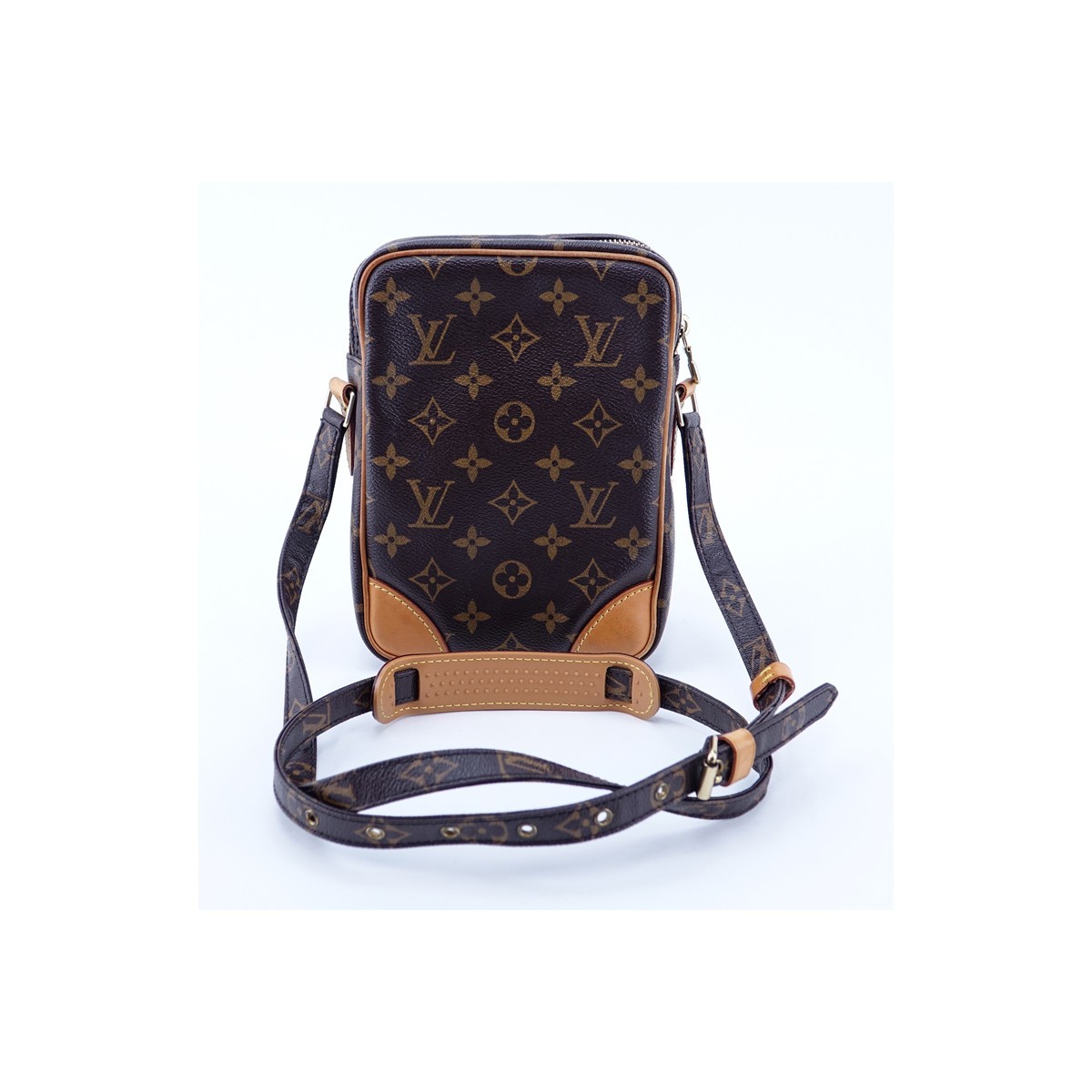 Louis Vuitton Brown Monogram Coated Canvas Amazone Messenger Bag. Golden brass hardware, brown interior with slip pocket.