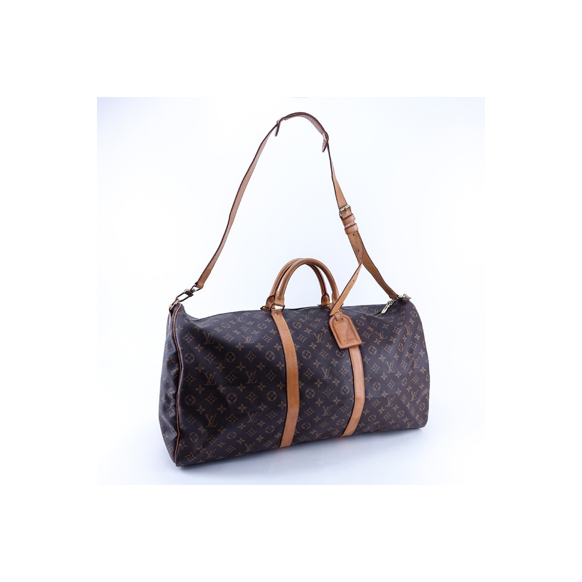 Louis Vuitton Brown Monogram Coated Canvas Keepall Bandouliere 50. Golden brass hardware.