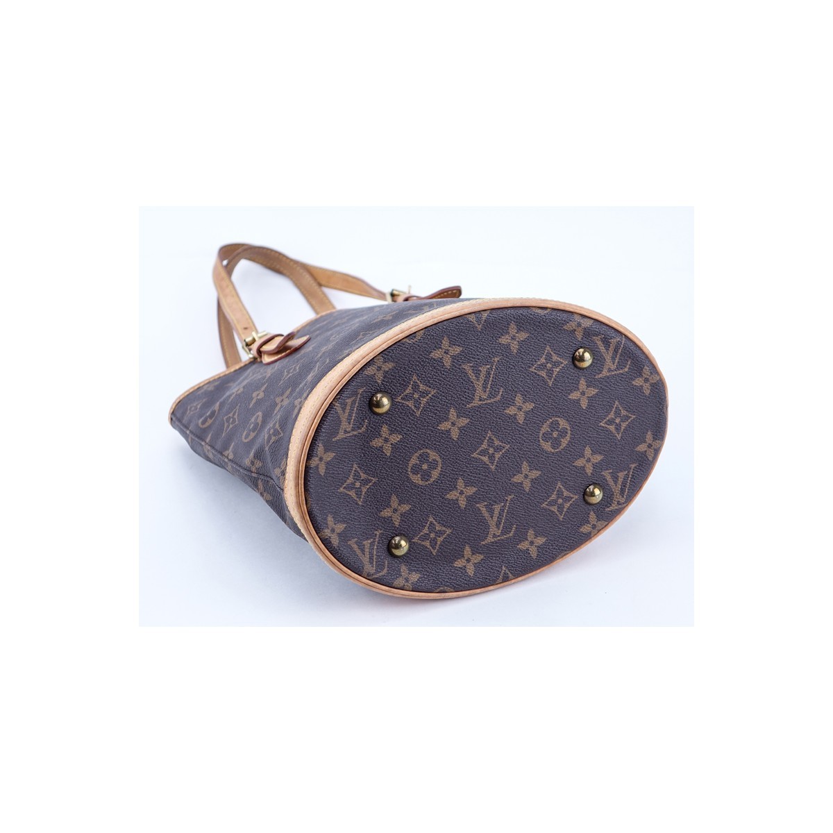 Louis Vuitton Brown Monogram Coated Canvas Bucket PM Bag. Golden brass hardware, beige leather interior with zipper and slot pockets, vachetta straps.