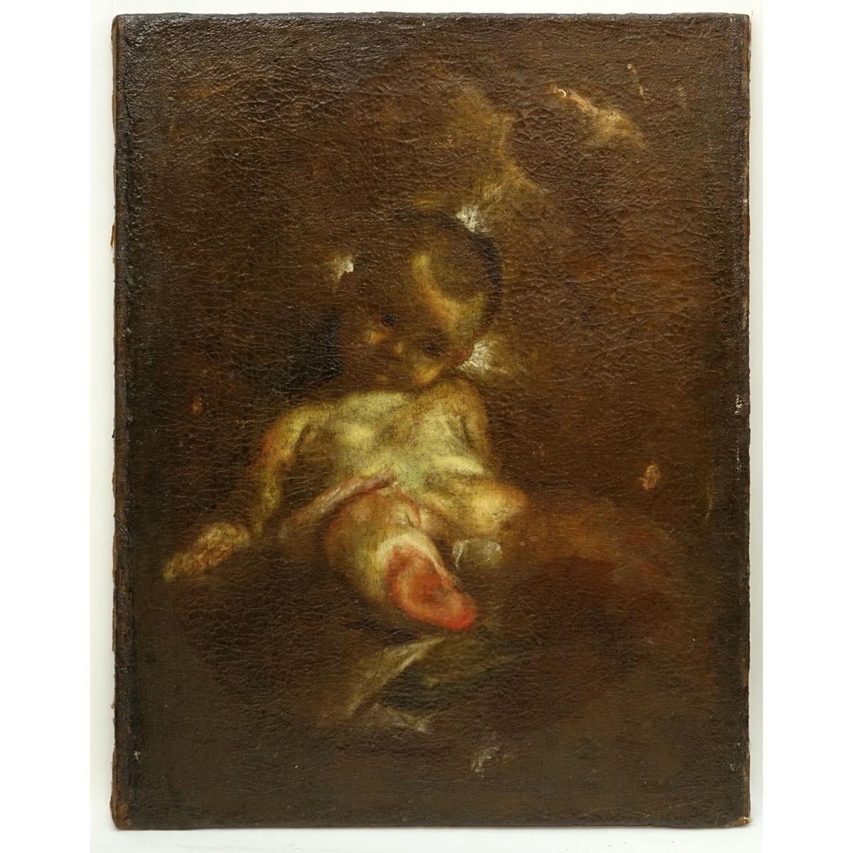 Attributed to: Federico Barocci, Italian (1526/28 - 1612) Oil on Canvas "Sketch of a Child", Label inscribed 'Federigo Barocci' with title en verso. Conserved condition, varnish throughout, heavy craquelure, in painting and darkening to canvas.