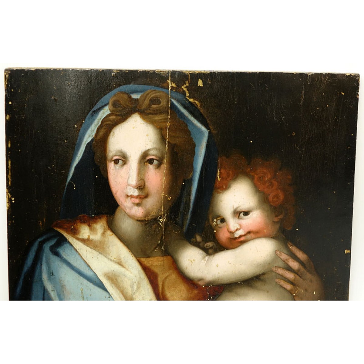 Large 16/17th Century Florentine School Oil on Panel, "Madonna and Child". Conserved condition, craquelure, varnish throughout, paint loss, hairline to center under the varnish.