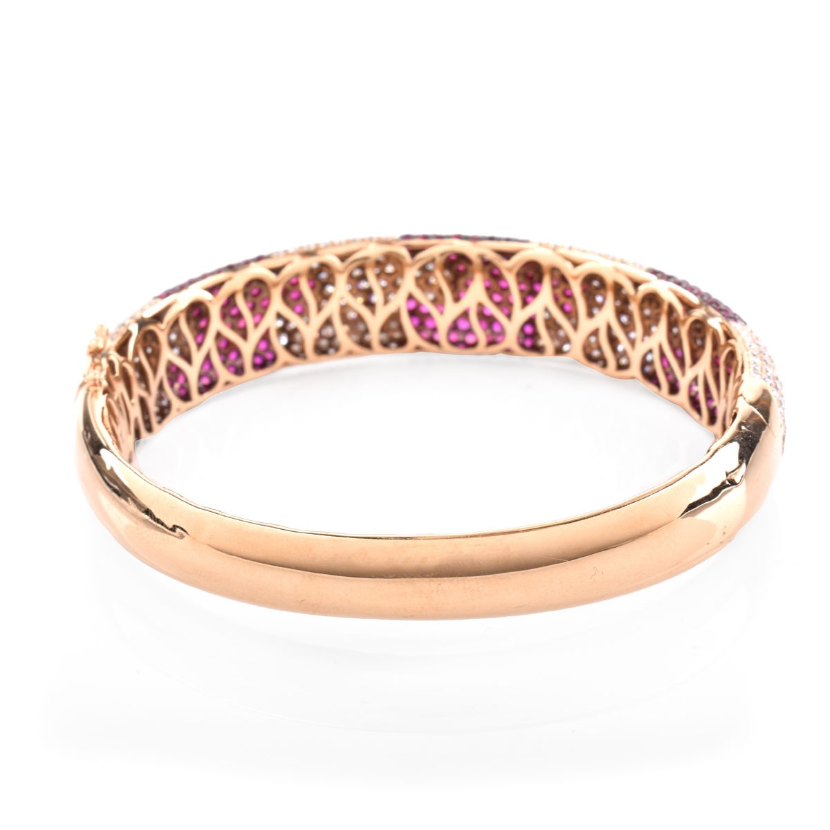 Contemporary Design 5.64 Carat Pave Set Round Cut Ruby, 5.08 Carat Round Cut Diamond and 18 Karat Rose Gold Hinged Bangle Bracelet. Rubies with vivid saturation of color.