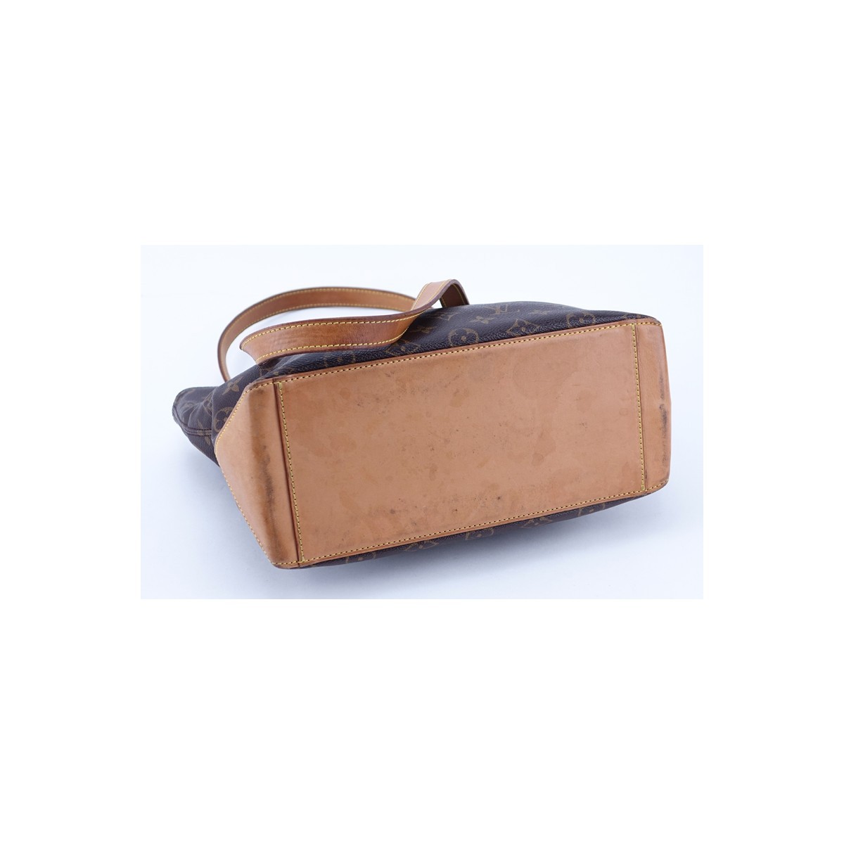 Louis Vuitton Brown Monogram Coated Canvas Cabas Piano Bag. Golden brass hardware, brown interior with zipper and patch pockets, vachetta straps.