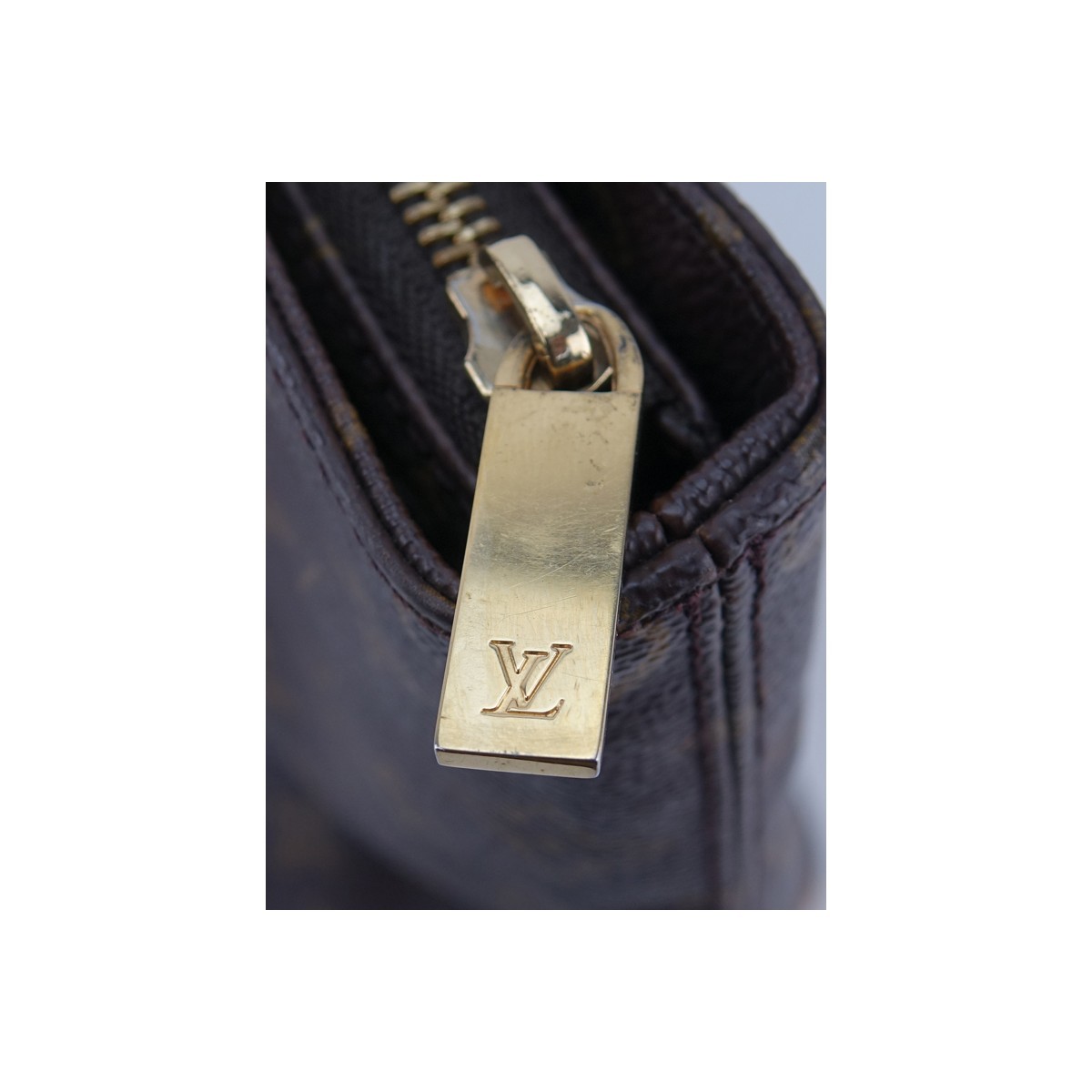 Louis Vuitton Brown Monogram Coated Canvas Cabas Piano Bag. Golden brass hardware, brown interior with zipper and patch pockets, vachetta straps.