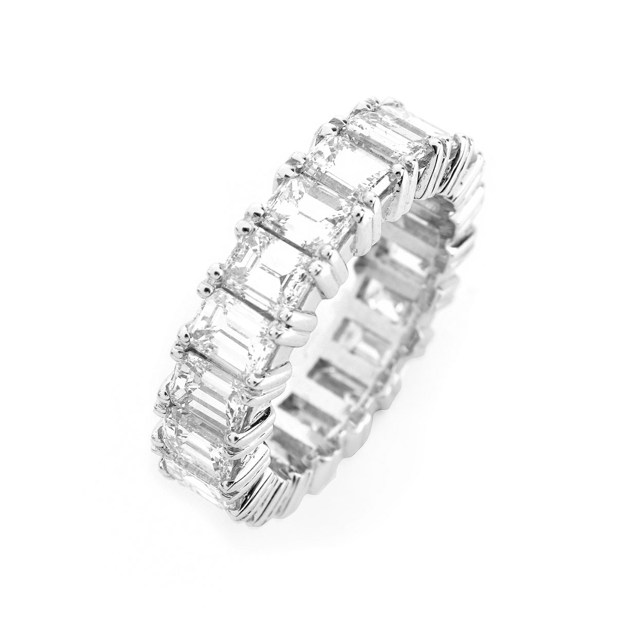 Approx. 7.0 Carat Emerald Cut Diamond and Platinum Eternity Band.