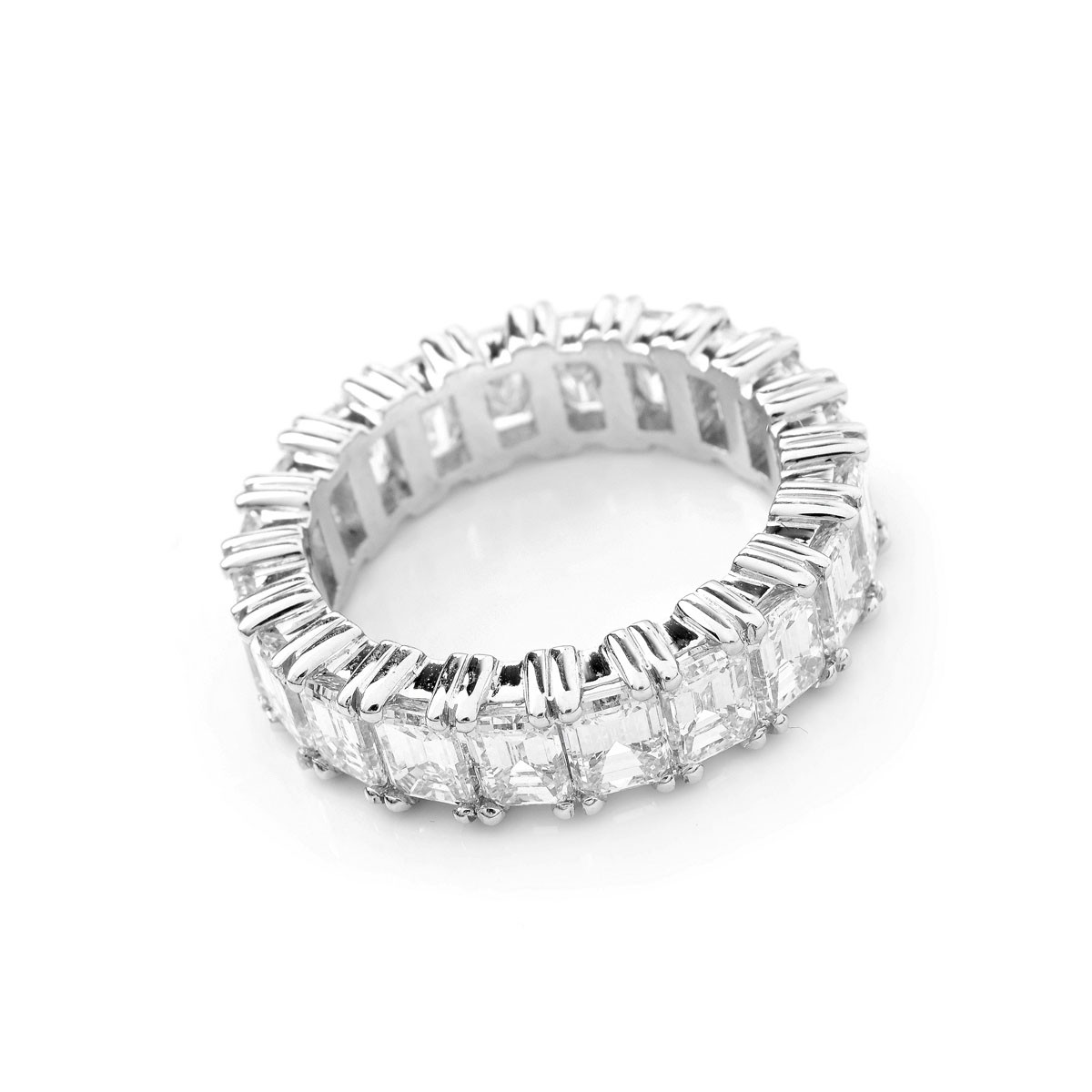 Approx. 7.0 Carat Emerald Cut Diamond and Platinum Eternity Band.