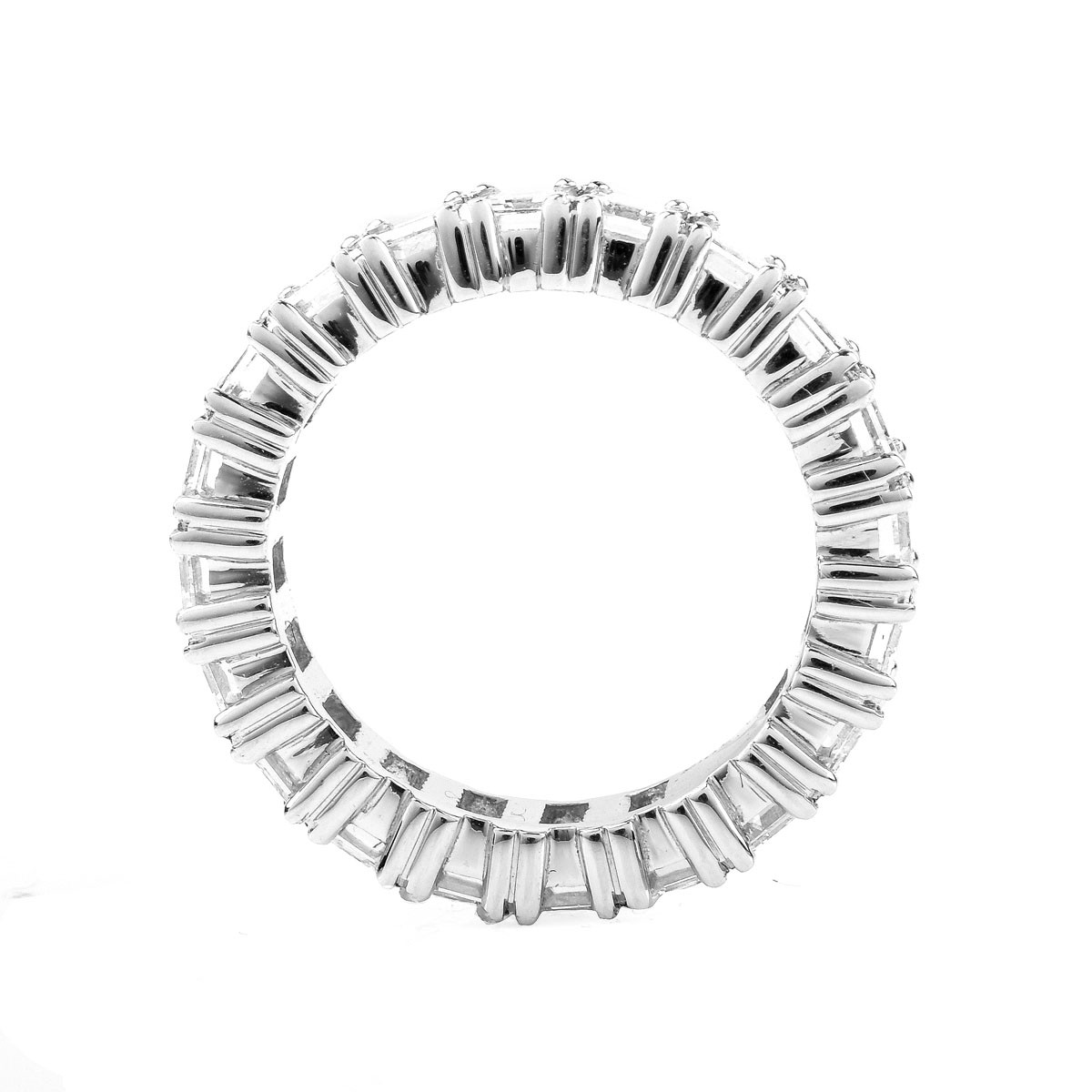 Approx. 7.0 Carat Emerald Cut Diamond and Platinum Eternity Band.