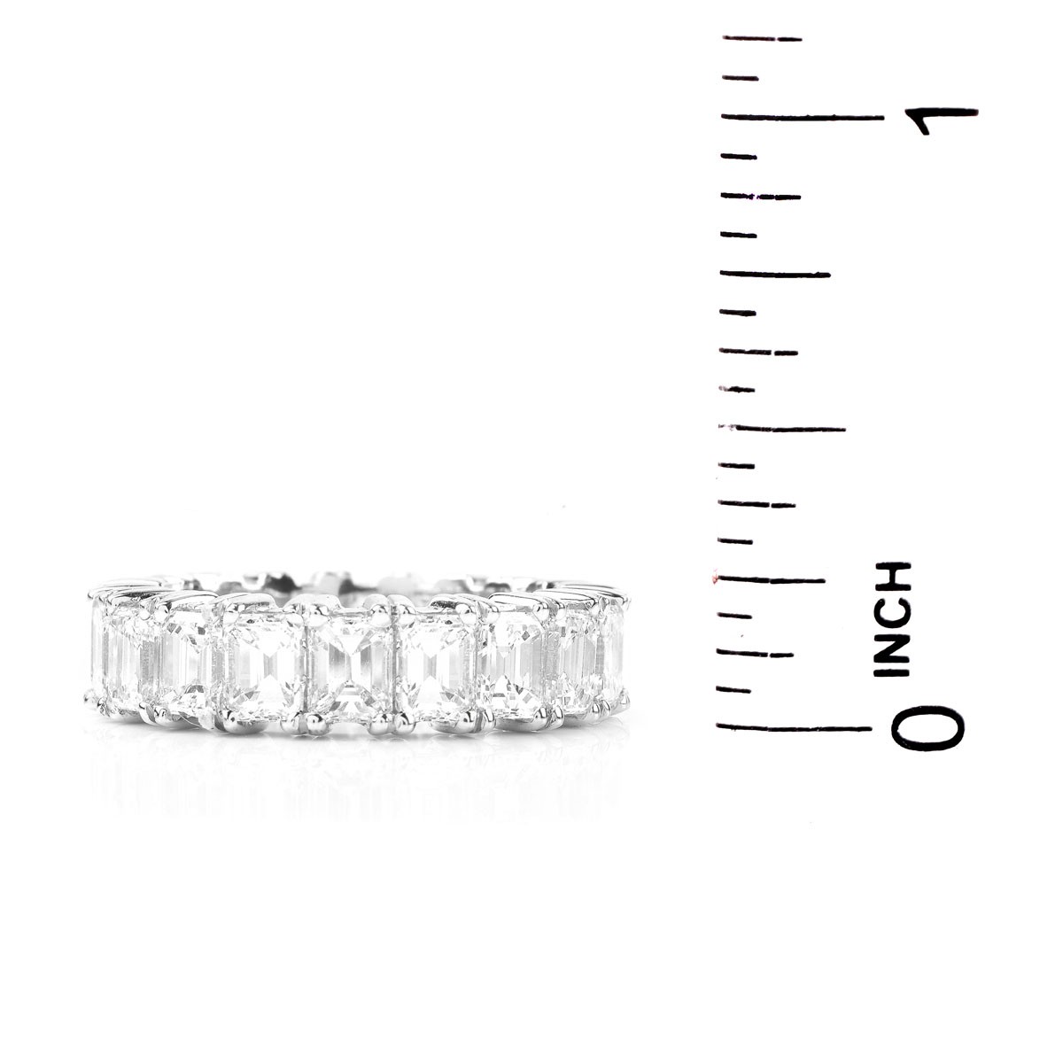 Approx. 7.0 Carat Emerald Cut Diamond and Platinum Eternity Band.