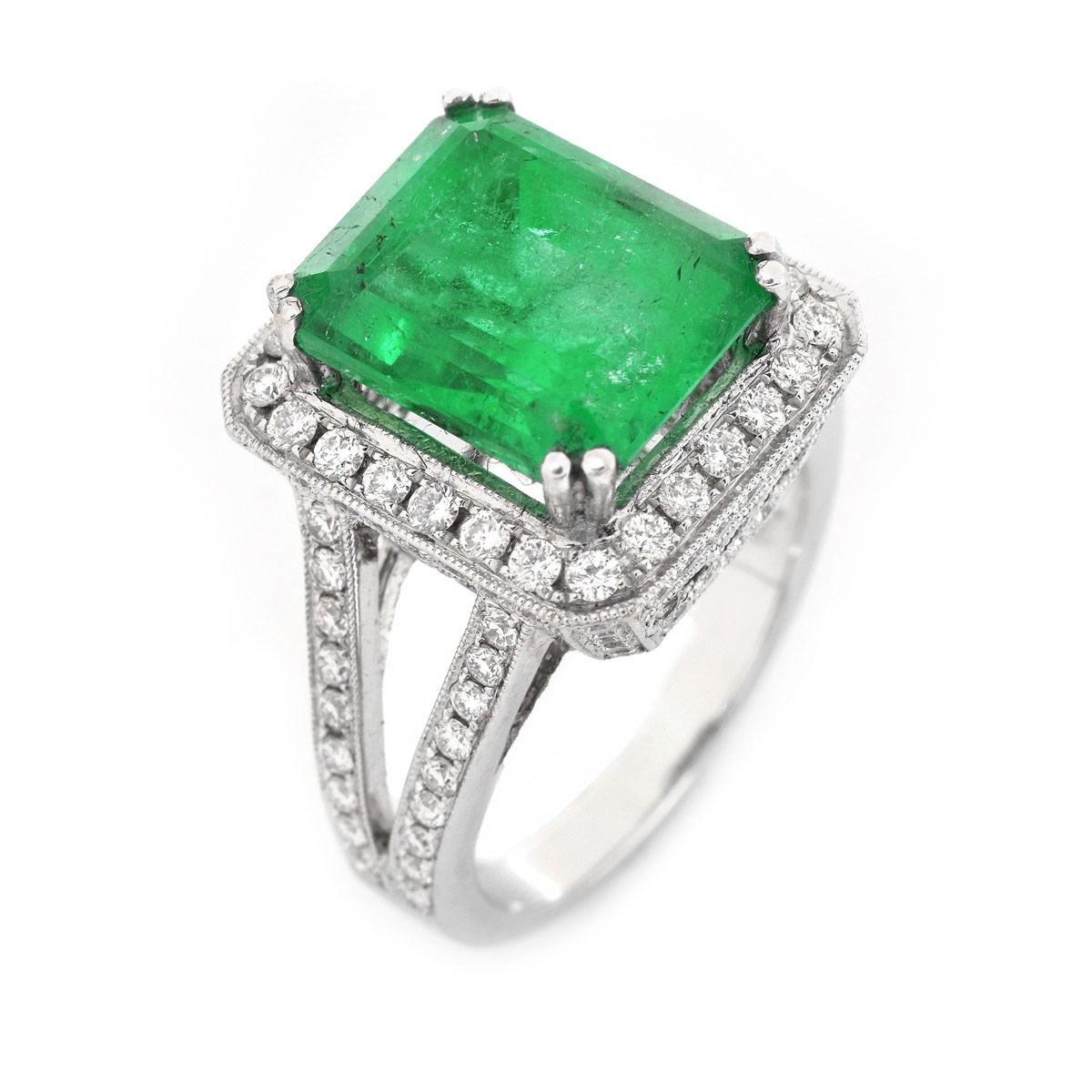 Approx. 6.35 Carat Colombian Emerald, 1.75 Carat Round Brilliant Cut Diamond and 18 Karat White Gold Ring.