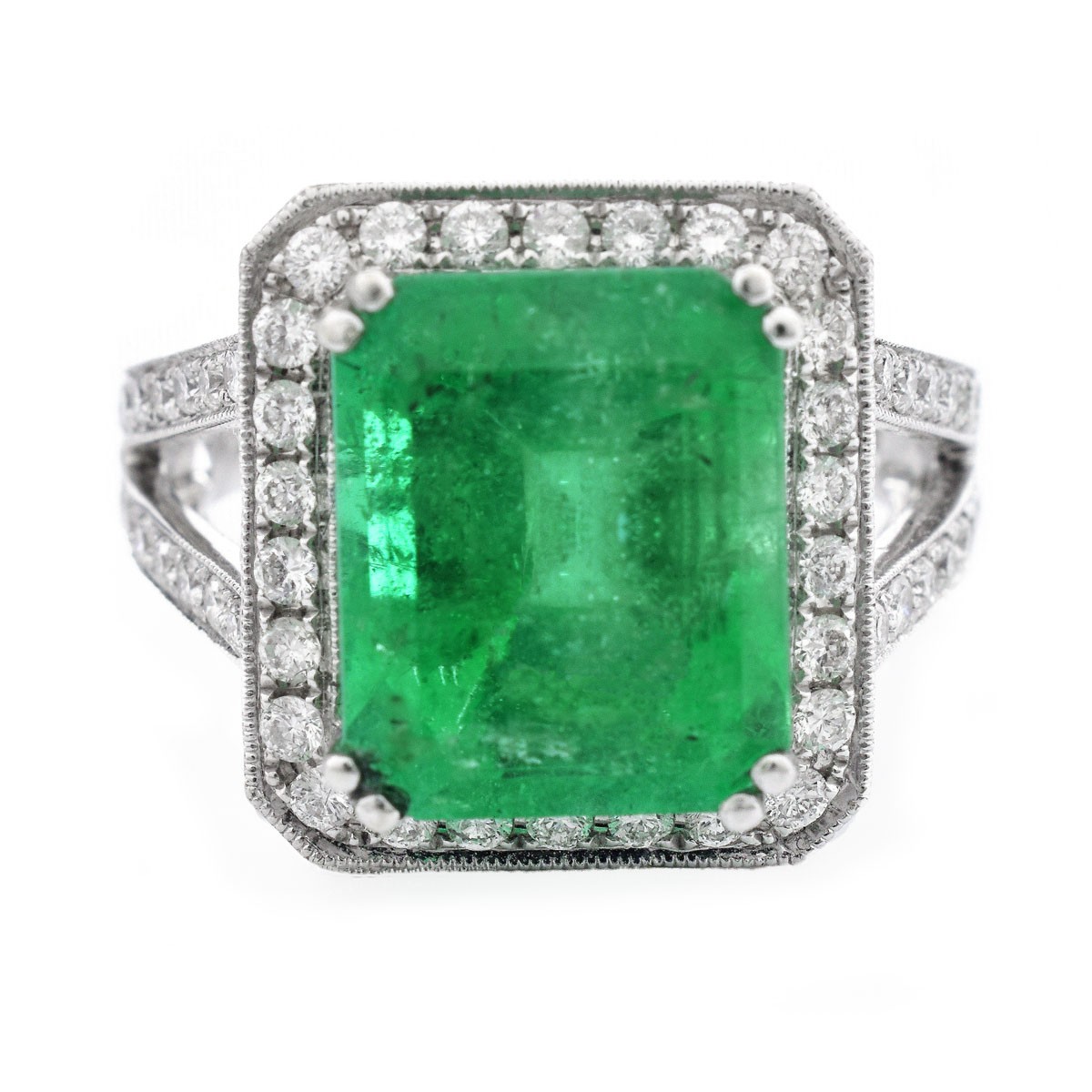 Approx. 6.35 Carat Colombian Emerald, 1.75 Carat Round Brilliant Cut Diamond and 18 Karat White Gold Ring.