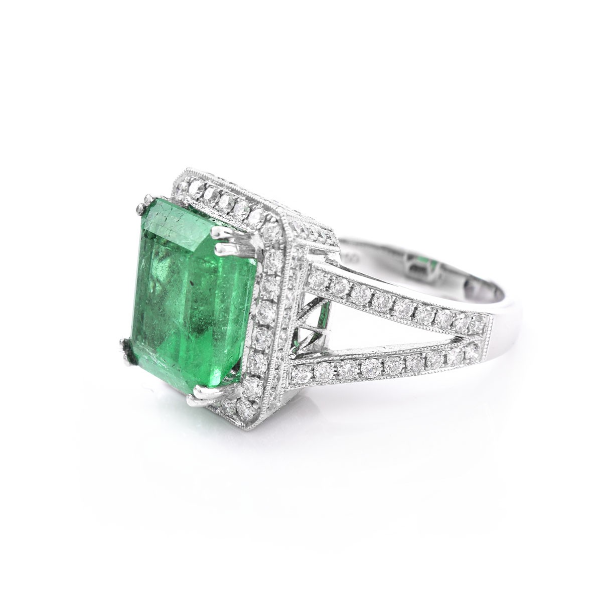 Approx. 6.35 Carat Colombian Emerald, 1.75 Carat Round Brilliant Cut Diamond and 18 Karat White Gold Ring.