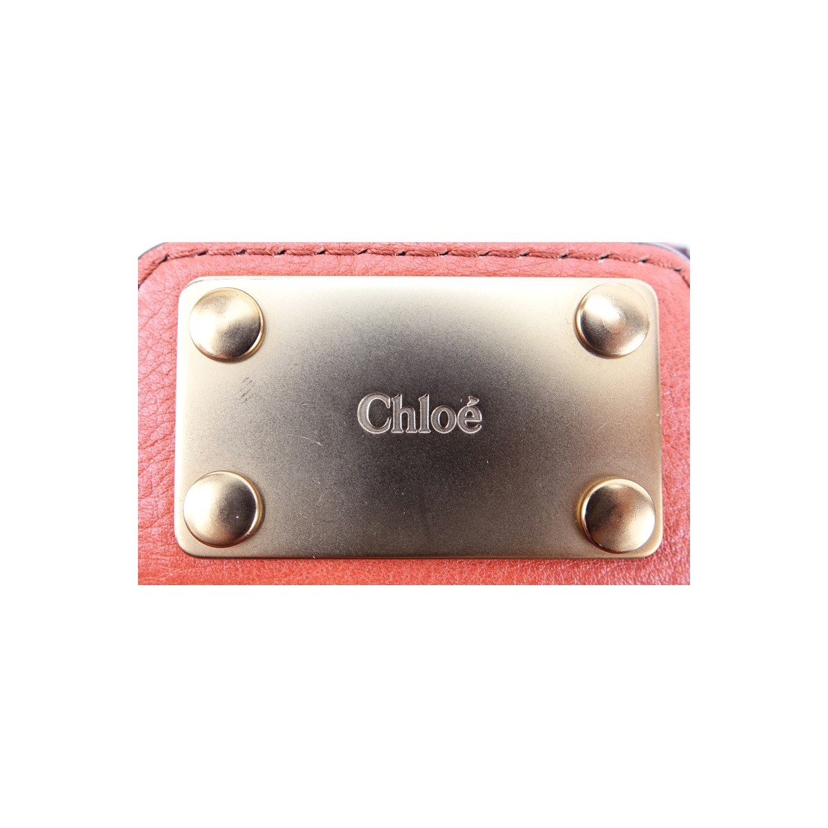 Chloe Dark Orange Grained Leather Paddington MM Handbag. Brushed gold tone hardware, beige fabric interior with zippered and patch pockets.