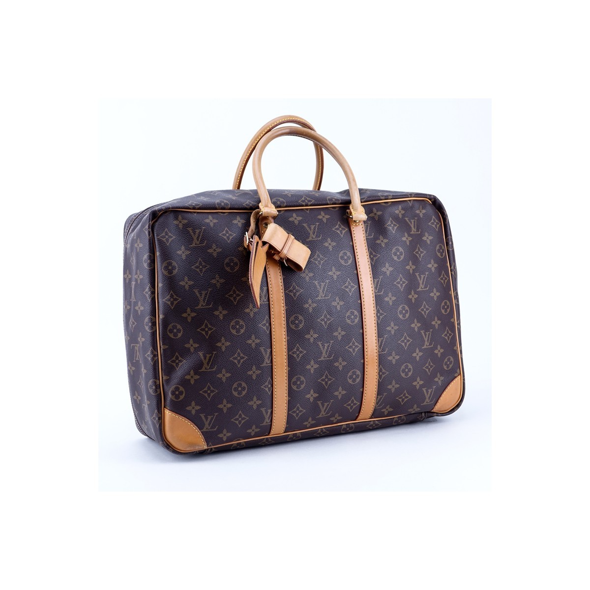 Louis Vuitton Brown Monogram Coated Canvas Sirius 45 Travel Bag. Golden brass hardware, beige interior, vachetta leather.