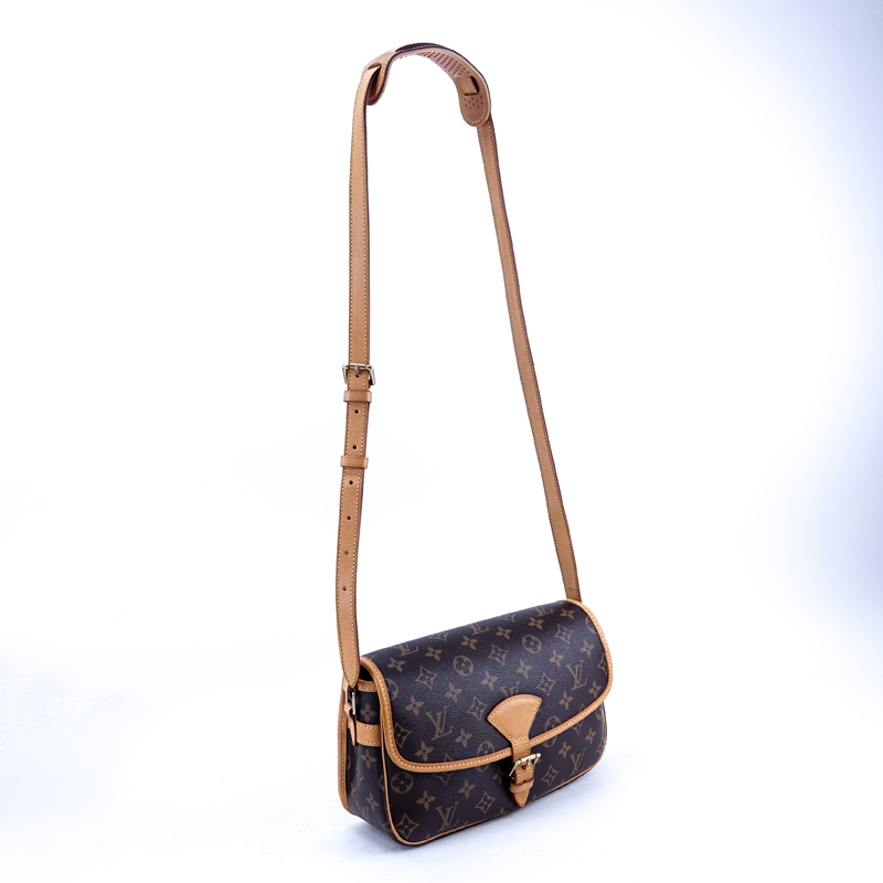 Louis Vuitton Brown Monogram Coated Canvas Sologne Shoulder Bag. Golden brass hardware, vachetta strap.