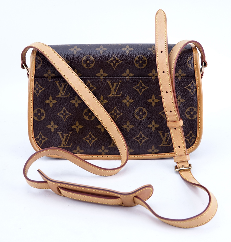 Louis Vuitton Brown Monogram Coated Canvas Sologne Shoulder Bag. Golden brass hardware, vachetta strap.