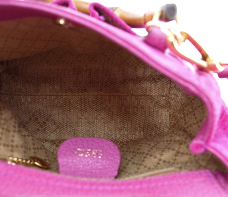 Gucci Pink Suede And Leather Bamboo Tote Mini. Canvas interior with zippered pocket, shoulder strap included.