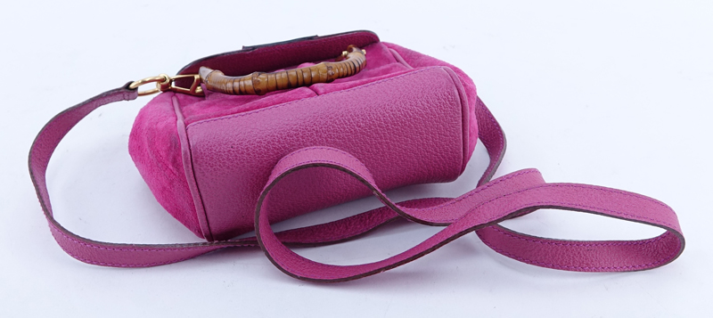 Gucci Pink Suede And Leather Bamboo Tote Mini. Canvas interior with zippered pocket, shoulder strap included.