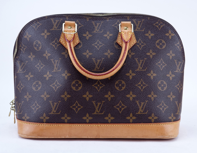 Louis Vuitton Brown Monogram Coated Canvas Alma PM Tote. Golden brass hardware, vachetta straps.