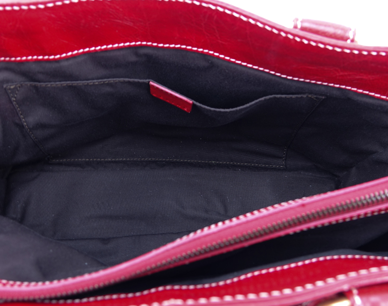 Celine Red Soft/Quilted Leather Boogie Bag With 2 Front Pockets. Brushed gold tone hardware, black canvas interior with zippered and patch pockets.