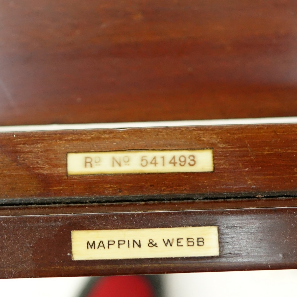 Attributed to: George Betjeman & Sons Circa 1910 Edwardian Mahogany Enclosed Dressing Table. The rectangular hinged top enclosing an interior fitted with three beveled mirror plates, above two hinged compartments flanked by two glass slides and a recessed