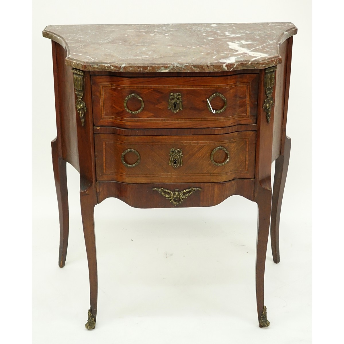 Early 20th Century Parquetry Inlaid Marble Top Commode with Bronze Mounts. Two drawers and stands on high cabriole legs.