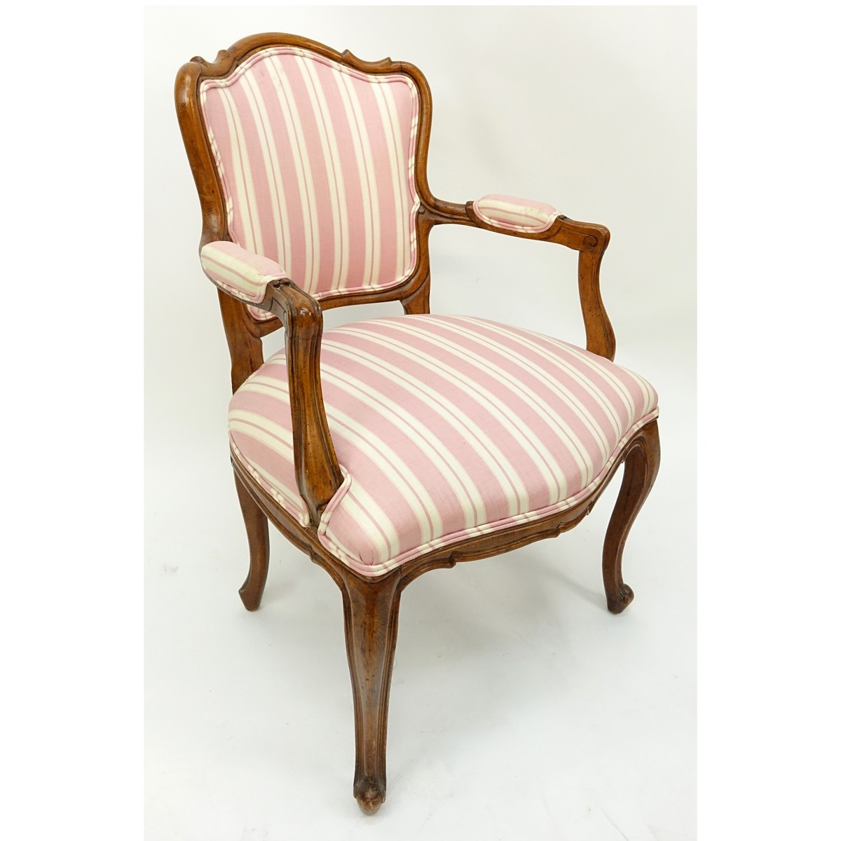 Vintage Italian Carved Wood and Upholstered Armchair Chair. Light scuffs and scratches to wood frame, backrest has some spotting to upholstery.