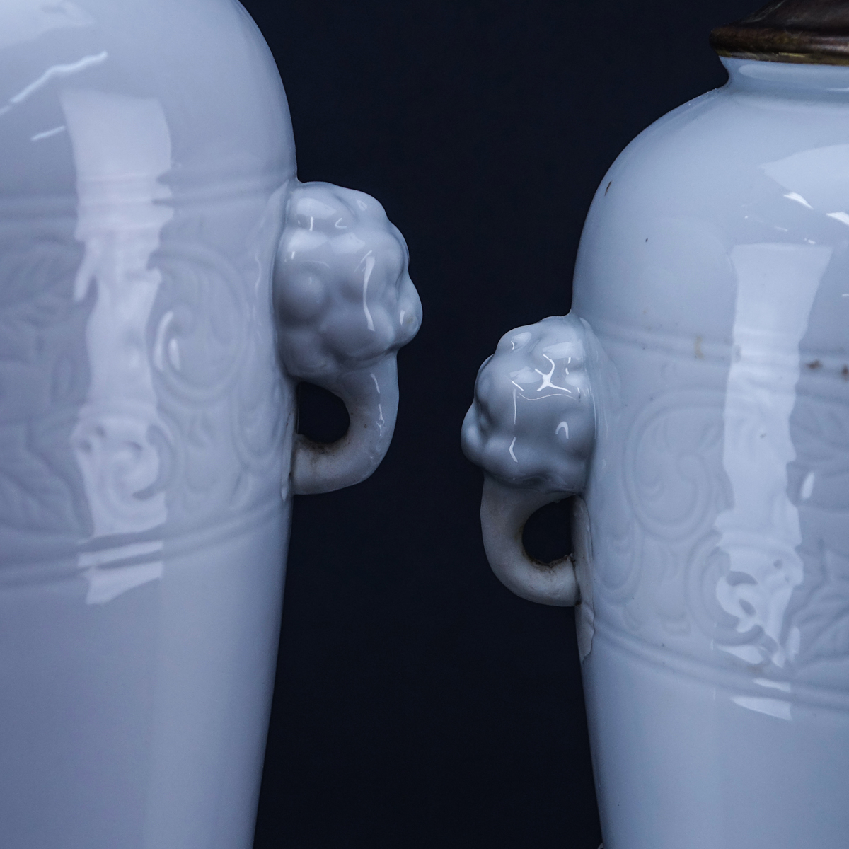 Pair of 20th Century Japanese Blanc de Chine Porcelain Lamps with Mock Handles. Good condition.