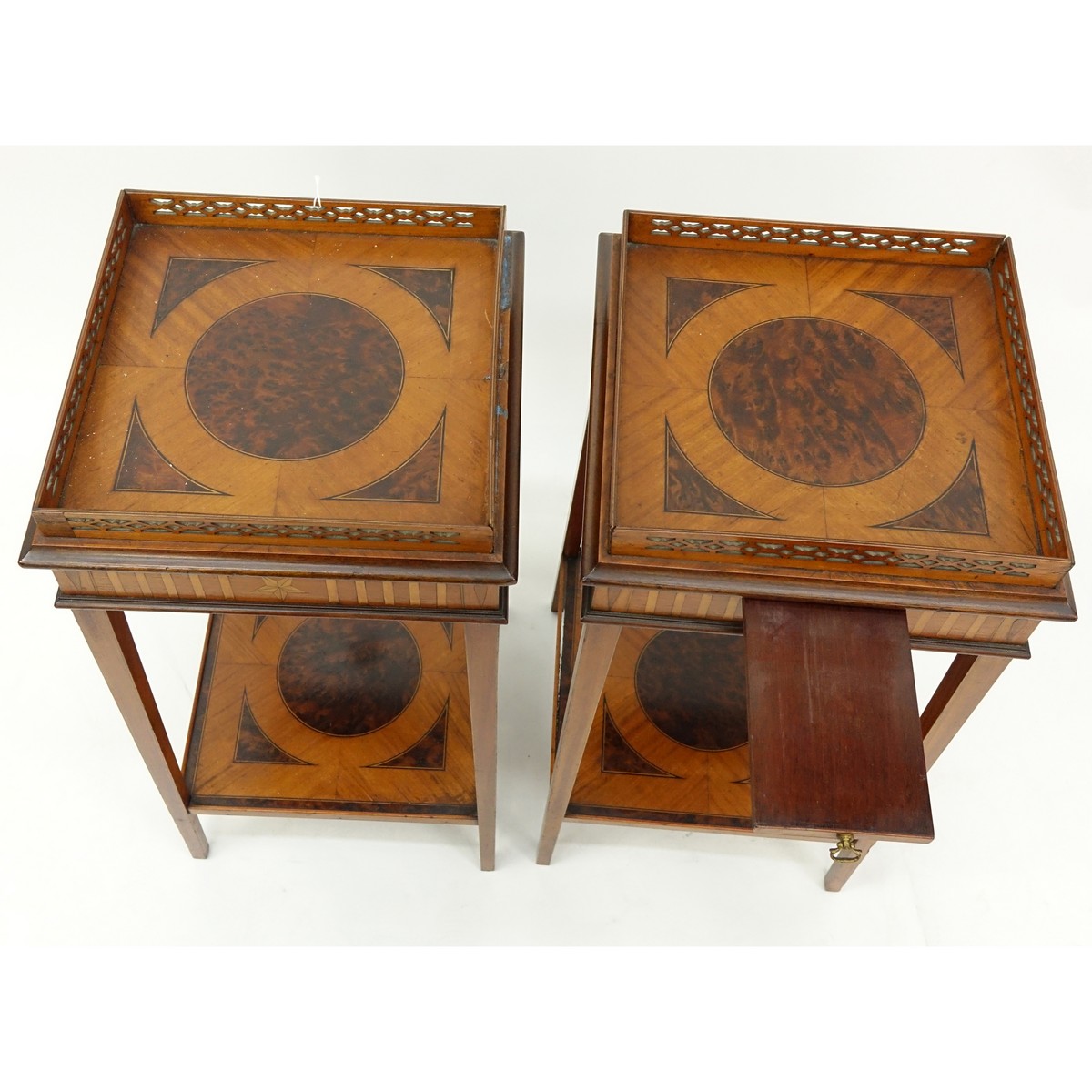 Pair of Edwardian Burled Inlaid Two Tiered Pedestal Tables with Gallery to Top. Sliding platform to top.