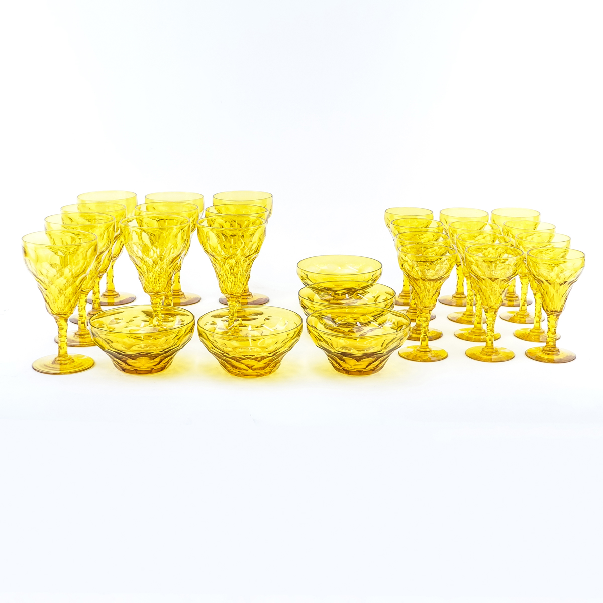 Twenty Eight (28) Piece Vintage Amber Crystal Stemware. Set includes: 10 goblets 6-1/4" H , 12 wine glasses 5-1/2", 6 bowls 3".