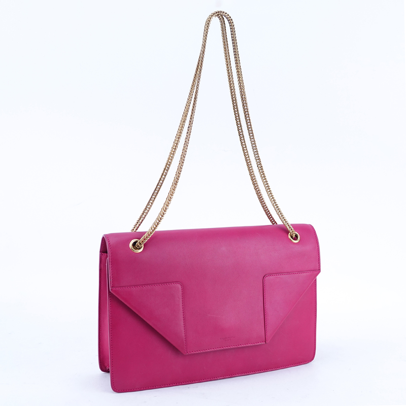 Saint Laurent Fuschia Leather Betty Handbag. Gold tone hardware and chain, suede interior with patch pocket.