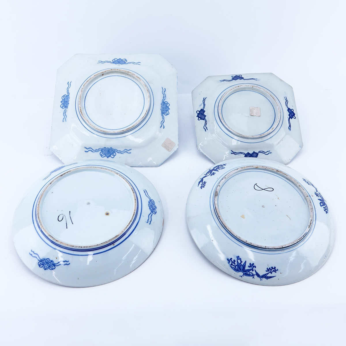 Four (4) Chinese Blue & White Pottery Chargers. Unsigned.