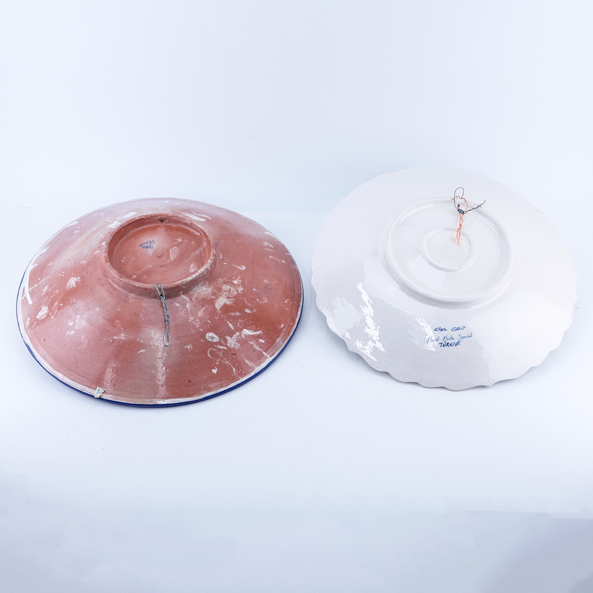 Grouping of Two (2): Large Chez Galip Turkish Pottery Charger, Large Safi Moroccan Pottery Charger. Each signed to base.