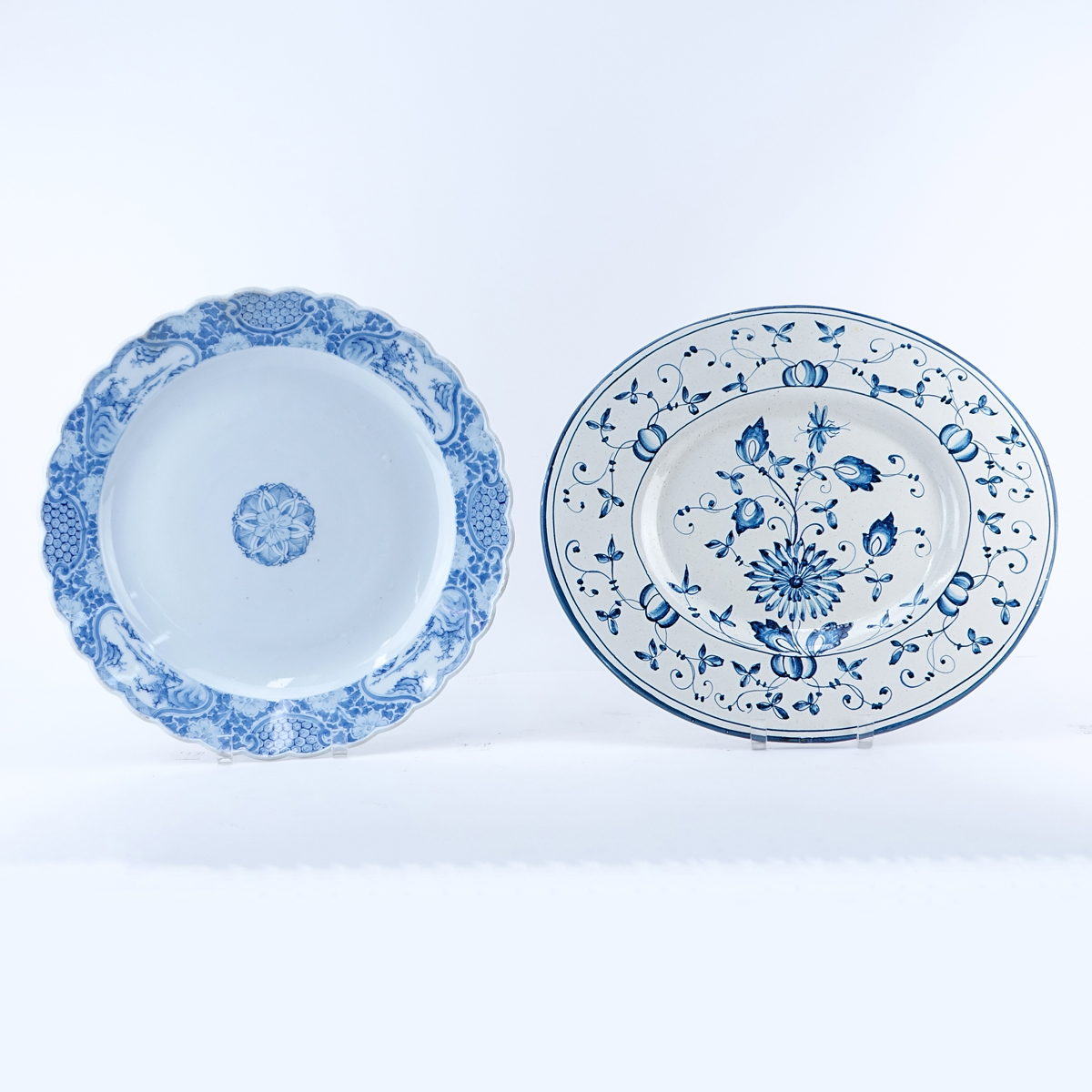 Grouping of Two (2): Large Italian Faience Blue and White Pottery Platters, Large Japanese Blue and White Porcelain Charger. Each signed to base.