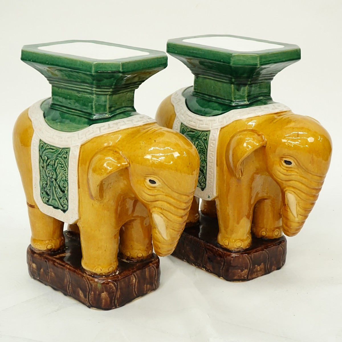 Pair of Chinese Sancai Style Glazed Pottery Elephant Garden Seats. Hong Kong mark to base.