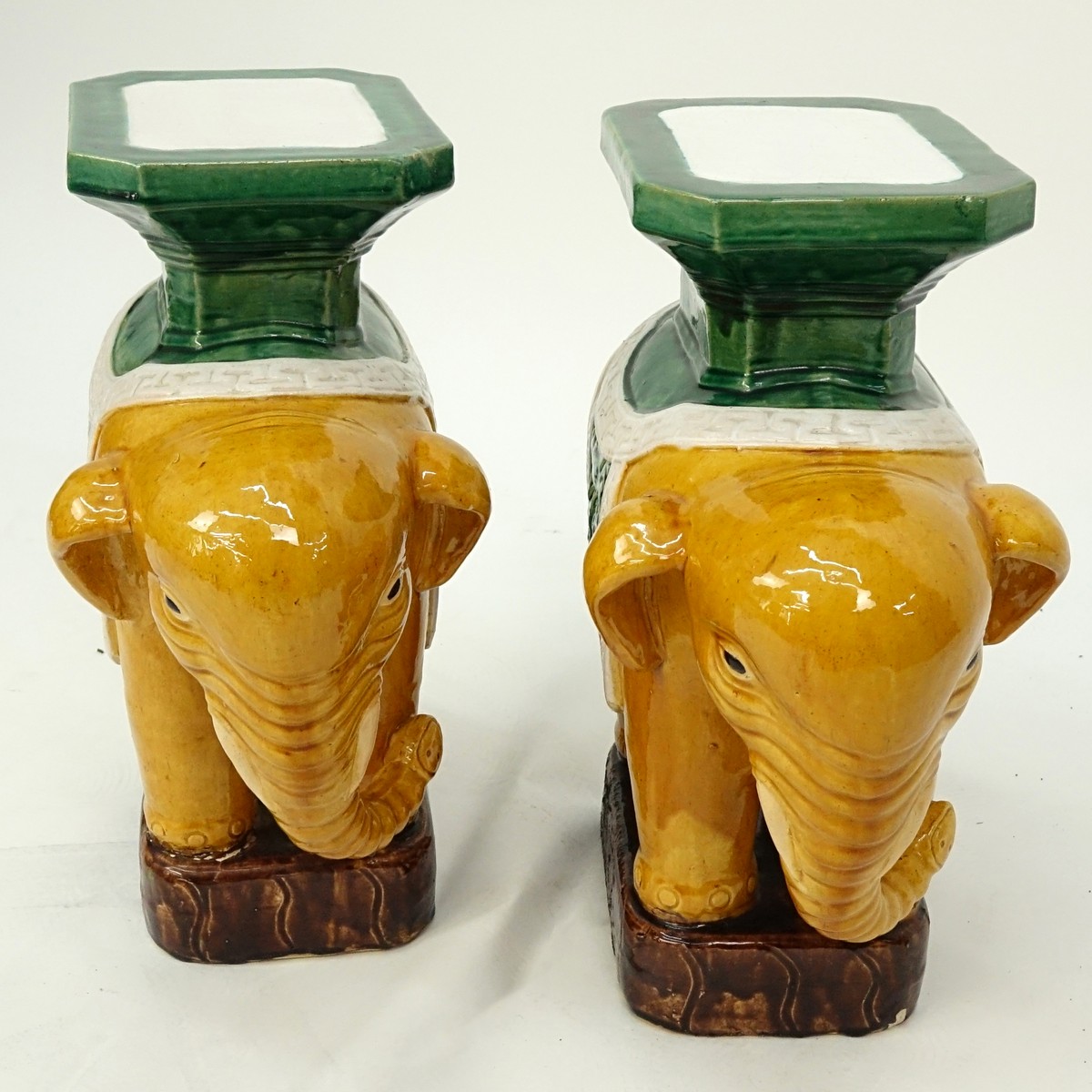 Pair of Chinese Sancai Style Glazed Pottery Elephant Garden Seats. Hong Kong mark to base.