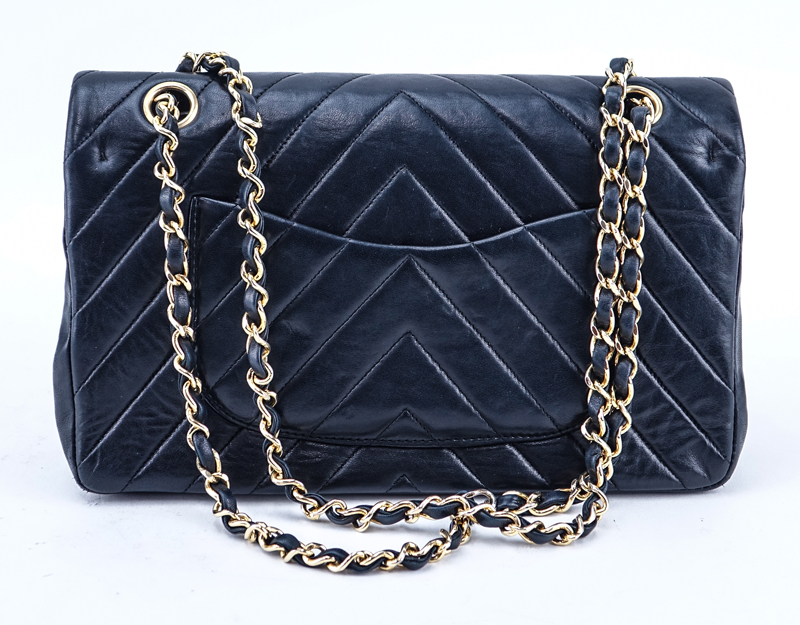 Chanel Black Quilted Chevron Motif Leather Double Flap Bag 23. Gold tone hardware.
