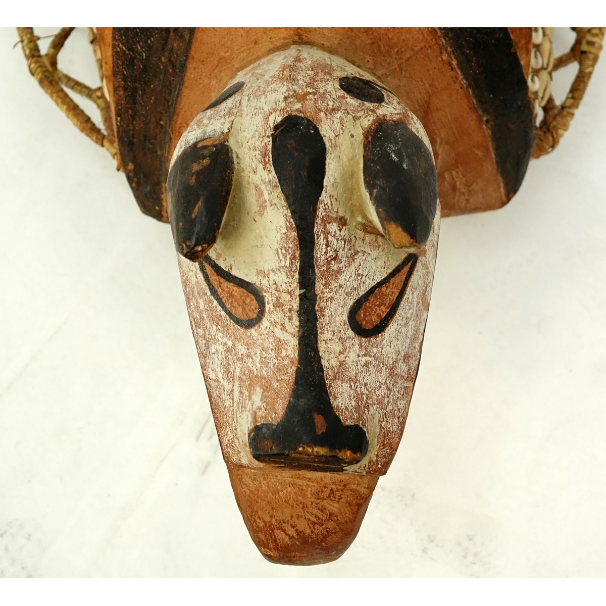 Large Wood Carved Polychrome Tribal Mask with Shell and Plaited Fibers. Possibly from the Sepik River, Papua New Guinea area.