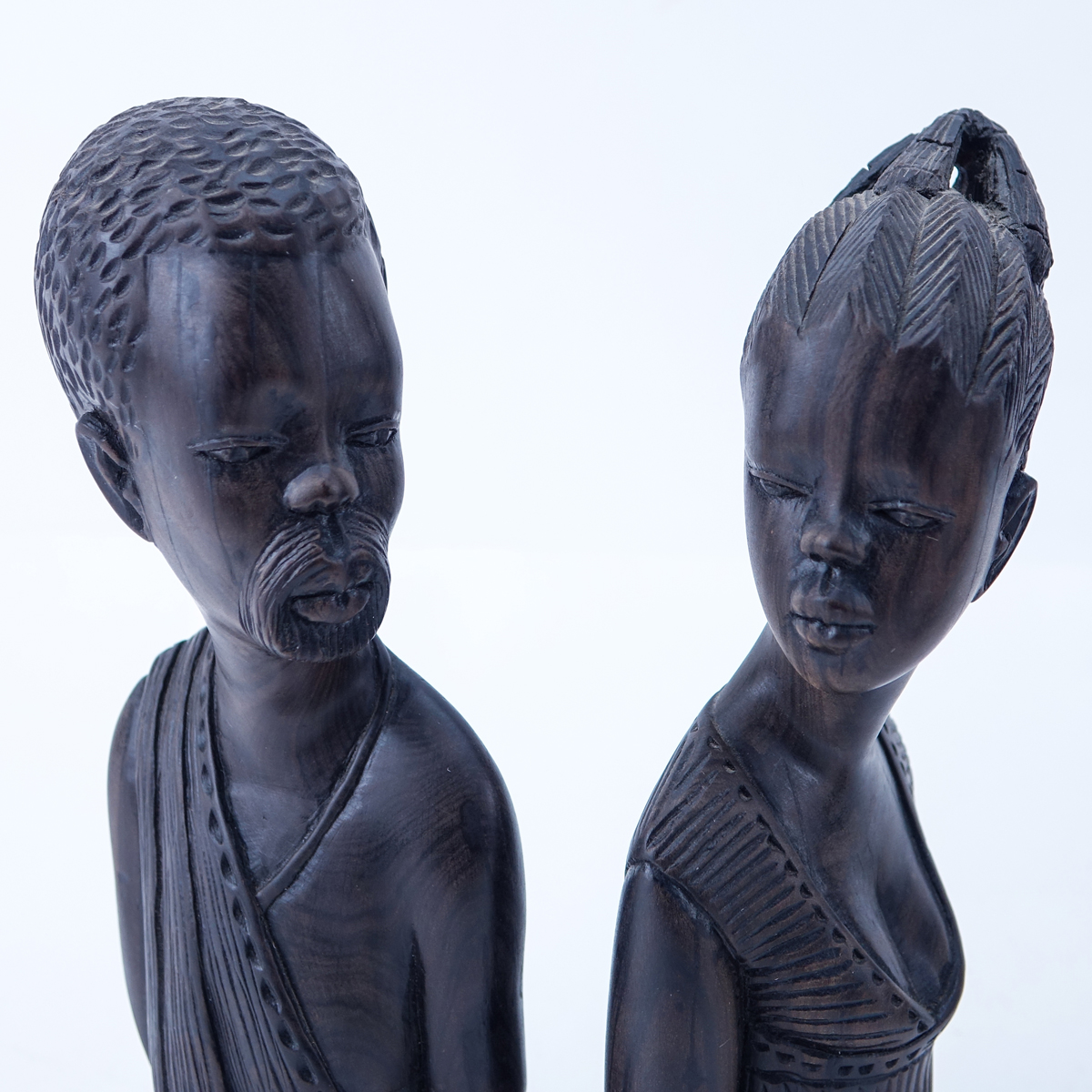 Collection of Four (4) Vintage Carved Figures. Includes 3 African Figures and a Chinese Wiseman Figure.