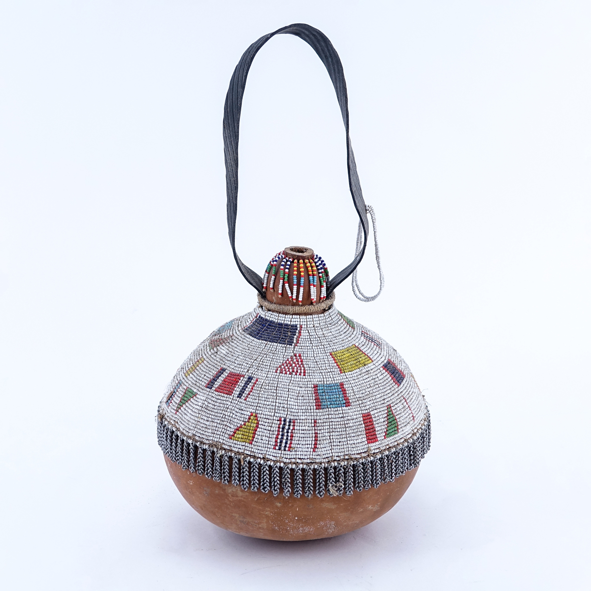 Antique African Beaded Gourd Calabash with Leather Handle, Possibly from the Zulu Tribe. Typical fraying overall good condition.