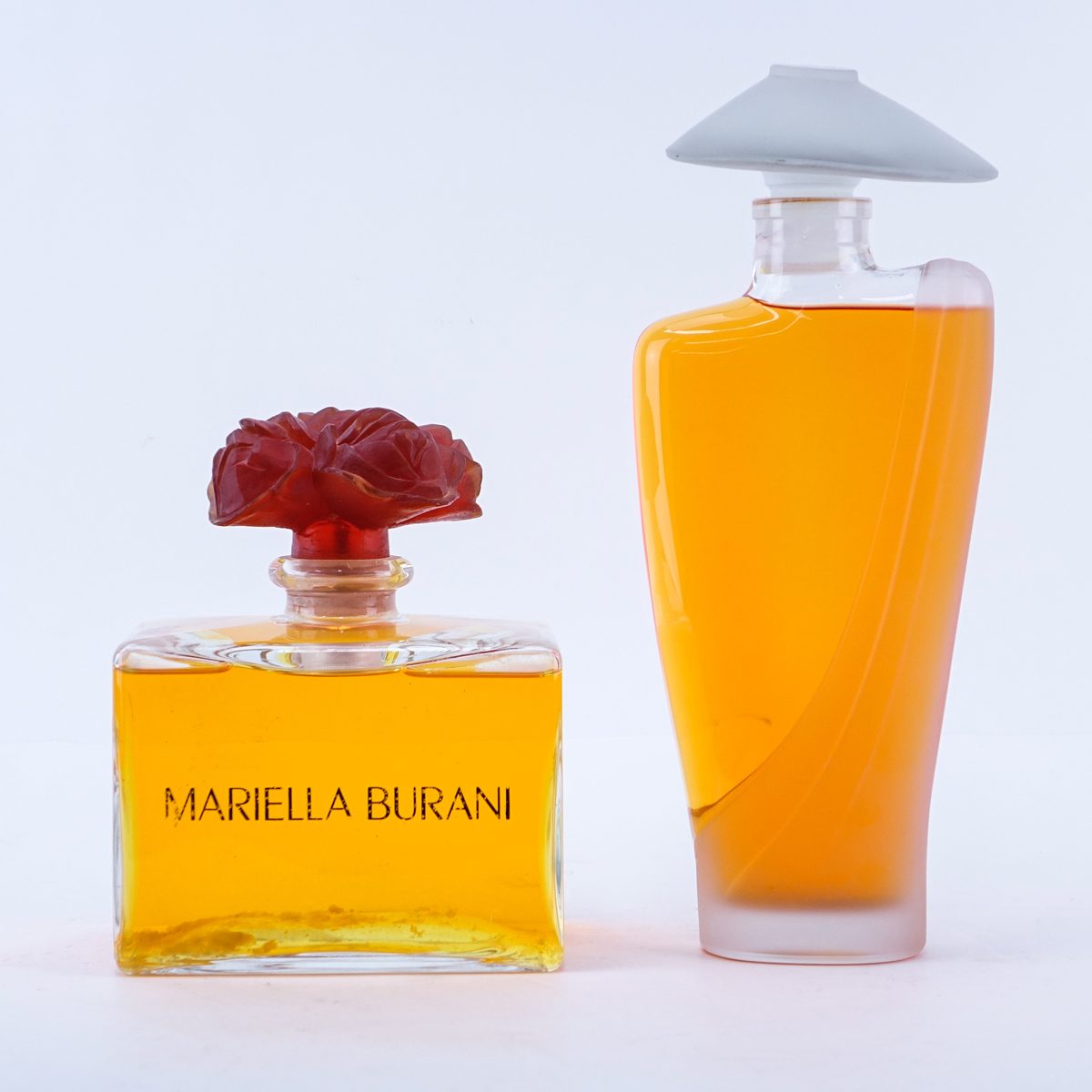 Grouping of Two (2): Large Mariella Burani Factice, Large Clear and Frosted Factice. Unused condition.