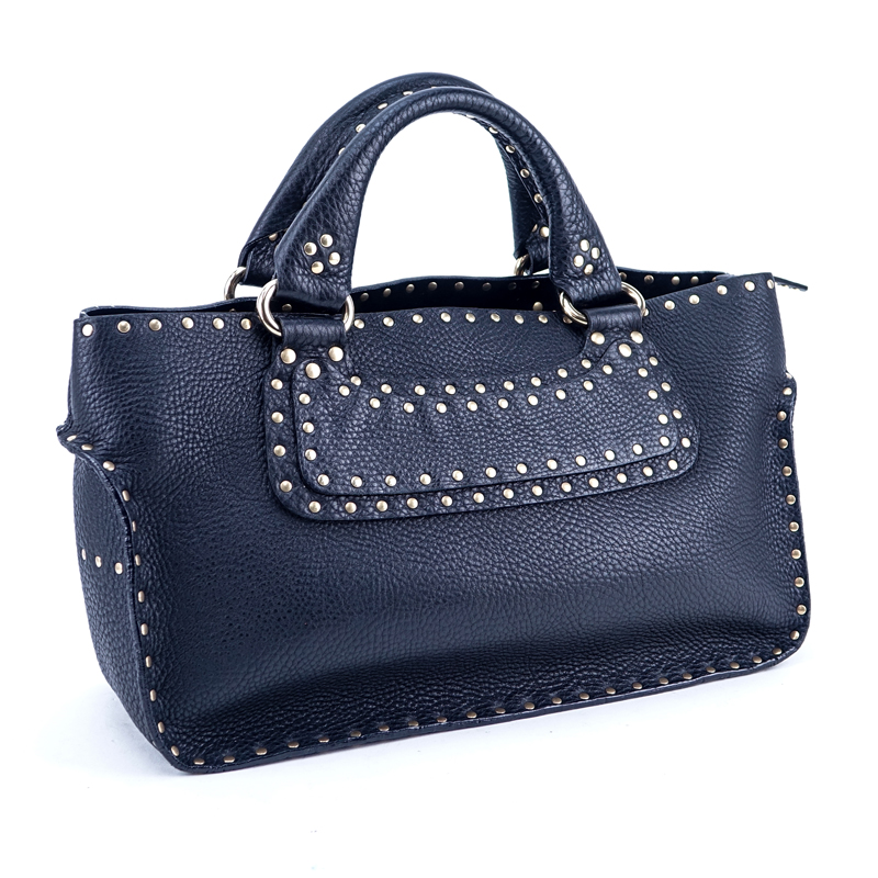 Celine Studded Black Grained Leather Boogie Handbag. Gold tone hardware, black suede interior with zippered and patch pockets.