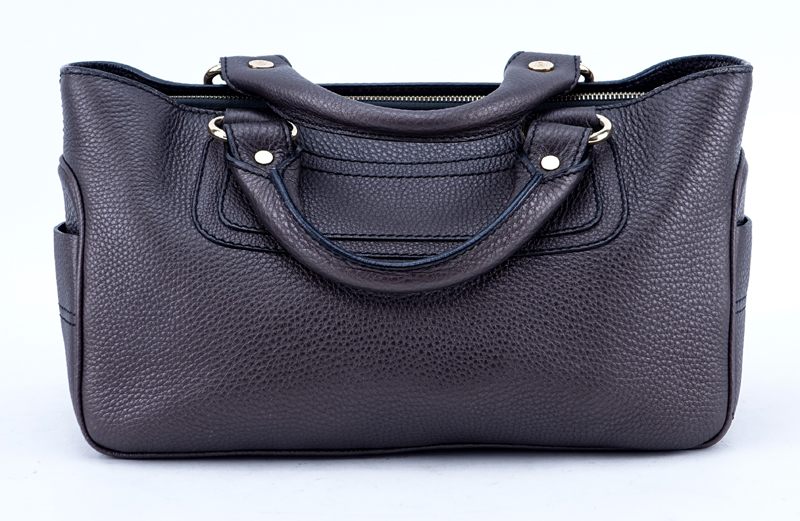 Celine Dark Bronze Leather Boogie Handbag. Gold tone hardware, signature fabric interior with zippered and patch pockets.