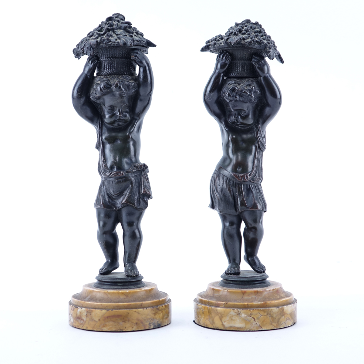 Pair of 19/20th Century Continental Bronze Putti Figures With Baskets on Sienna Marble Bases. Unsigned.