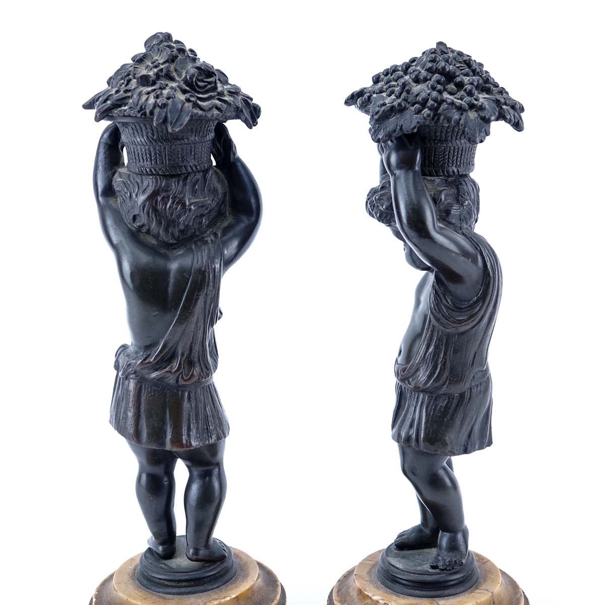 Pair of 19/20th Century Continental Bronze Putti Figures With Baskets on Sienna Marble Bases. Unsigned.