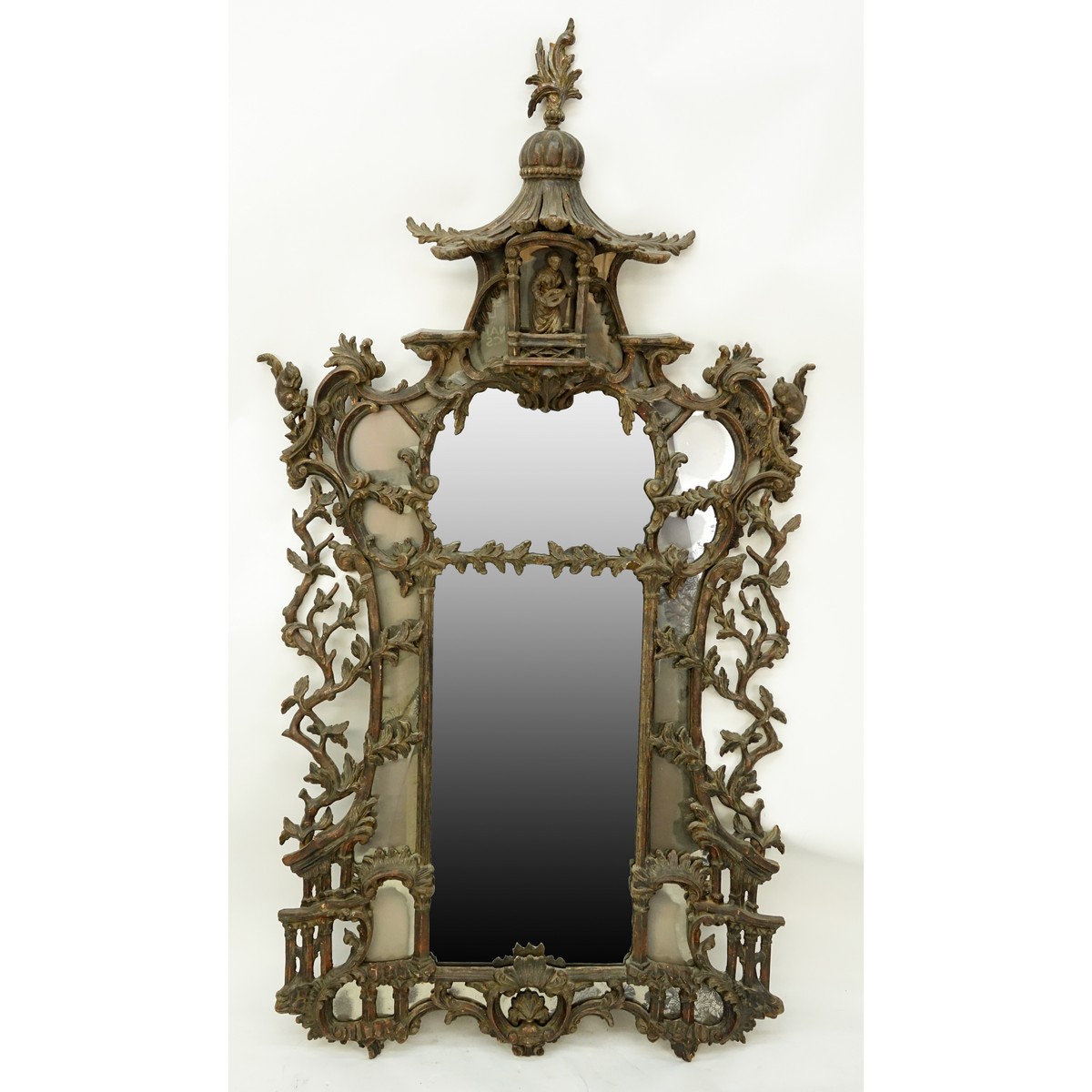 Impressive Large 19/20th Century Carved Wood Chinoiserie Pagoda Mirror. With a seated figure in the pagoda, squirrels, architectural and ornate foliate elements.