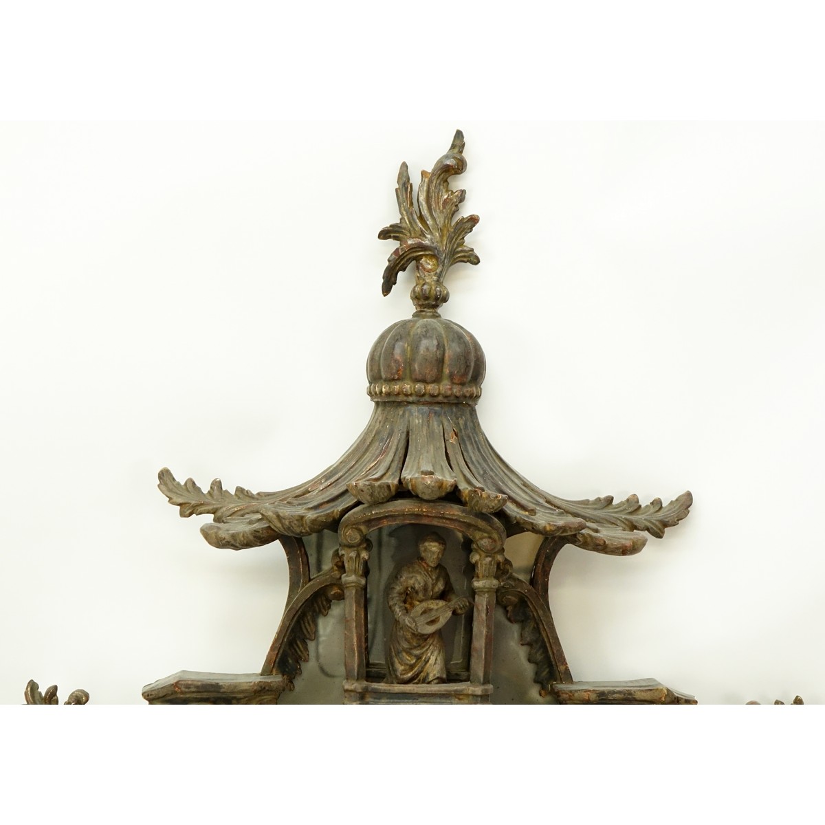 Impressive Large 19/20th Century Carved Wood Chinoiserie Pagoda Mirror. With a seated figure in the pagoda, squirrels, architectural and ornate foliate elements.