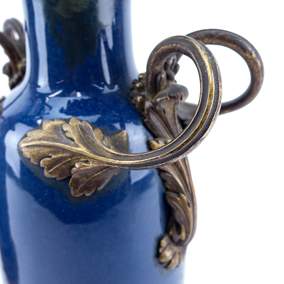 Pair of Gilt Bronze Mounted Cobalt Glazed Porcelain Lamps. Possible restoration or rubbing along the rim and handles.