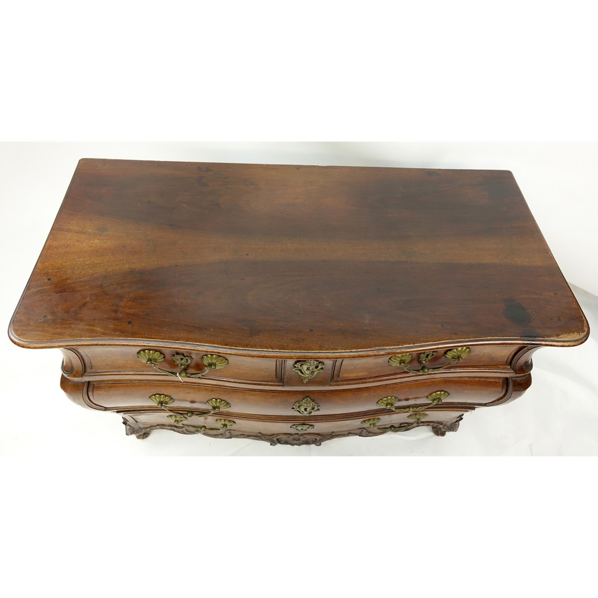 Good 18/19th Century Louis XV French Carved Walnut Commode en Tombeau. Two shaped single drawers with two large drawers.