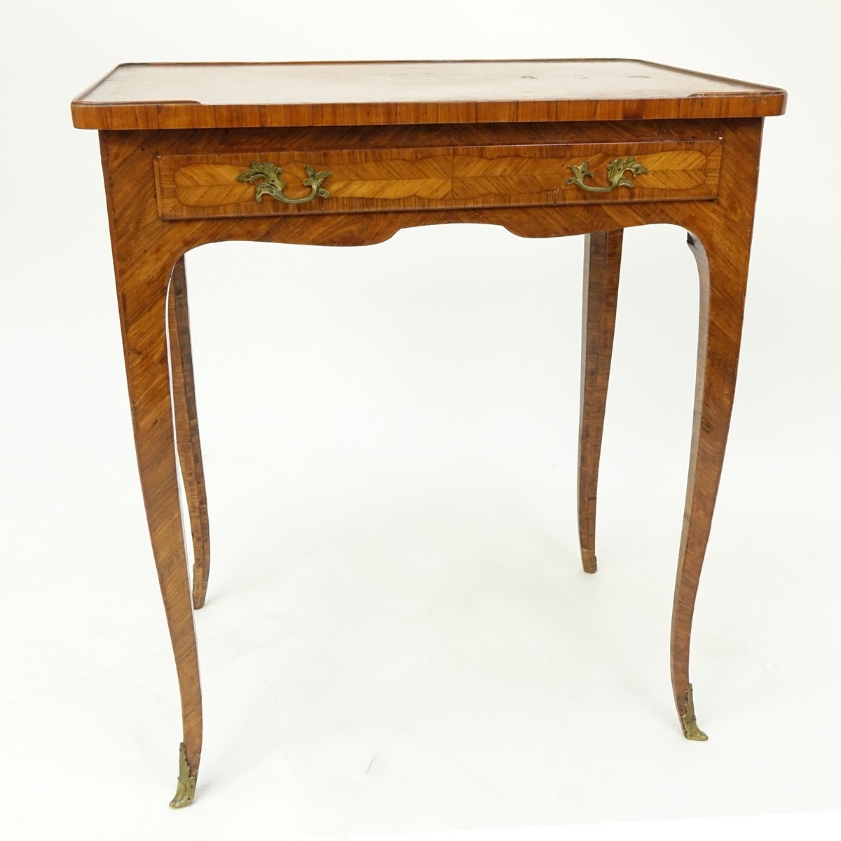 19th Century French Kingwood Inlaid Side Table with Gilt Bronze Mounts. Large sliding drawer and stands on tapering cabriole legs.